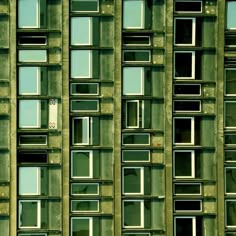 the side of an old building with many windows