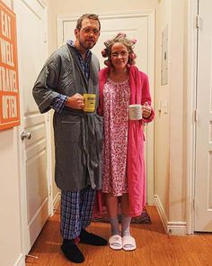 a man and woman standing in front of a door holding coffee mugs with the caption diy old married couple costumes