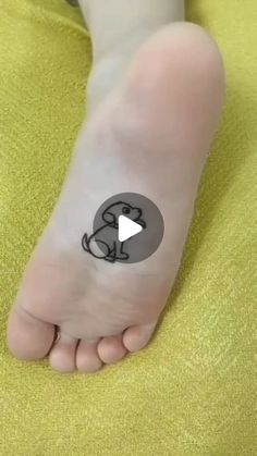 a person with a small tattoo on their foot