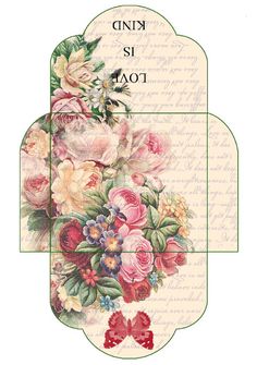 a cross stitch pattern with flowers on the front and back of it, as well as an envelope