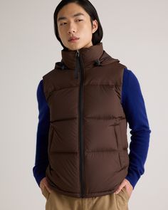 The perfect vest for your cold-weather adventures is here: our Responsible Down Puffer Vest. You'll be warm and protected in all types of weather, and the water-repellent and wind-resistant fabric make this vest perfect for any winter activity. The classic fit allows extra room for layering, so you can wear it as a layering piece in cooler temperatures, or with a lightweight tee as the temperature rises. Plus, our down products are sourced responsibly to ensure best practices in animal welfare. Down Vest With Padded Collar, Sleeveless Down Vest With Padded Collar, Sleeveless Vest With Fleece Lining For Outdoor Activities, Winter Outdoor Vest With Fleece Lining, Sleeveless Outdoor Winter Outerwear, Sleeveless Brown Outerwear For Outdoor, Sleeveless Down Puffer Vest, Fall Outdoor Vest Outerwear, Sleeveless Vest With Fleece Lining For Winter