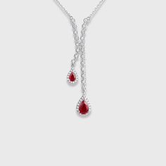 Crafted in luxurious 18K white gold, this necklace features a captivating pear-shaped ruby, the birthstone of July, representing love and passion. The exquisite design exudes timeless elegance, reflecting her unique style and personality. Luxury Pear-shaped Birthstone Jewelry, Luxury Pear-shaped Jewelry For Valentine's Day, Luxury Pear-shaped Birthstone Necklaces, Elegant Pear-shaped Drop Necklace For Formal Occasions, Formal Pear-shaped Gemstone Necklaces, Formal Pear-shaped Gemstone Necklace, Fine Jewelry Pear-shaped Drop Necklace For Formal Events, Elegant Gemstone Drop Necklace For Anniversary, Elegant Ruby Briolette Necklace