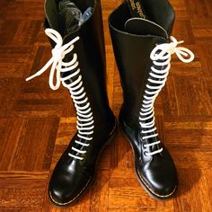 Presenting An Amazing Pair Of 1770 Solovair Made 20 Hole Tall Boots In Black. This 1988 (Round Seal) Model Comes In Perfect Condition...10/10 Practically Zero Prior Wear Evidence. (Step Break Creases) Astronaut Cut Puritans. Painted Pull Tags. Bright & Tight Verticle Gold Welt Stitch Mounted On A "Ben" Combat Sole. These Are The Cats Meow. Uk4/Us5/W6 Doc Marten Boots, Doc Marten Boot, Doc Marten, Doc Martens, Cats Meow, Moto Boots, Tall Boots, Tights, England