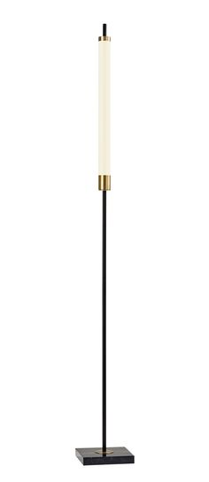 a black and gold floor lamp with a white light on it's side, against a white background