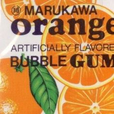 there is an orange advertisement on the front of this gump box that says, marukawa orange artifically flavored bubble gum