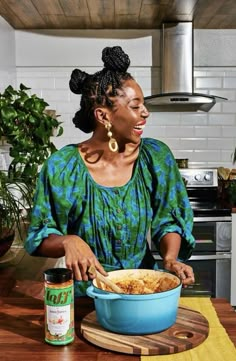 a woman standing in front of a bowl of food