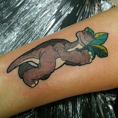 an arm with a cartoon character on it