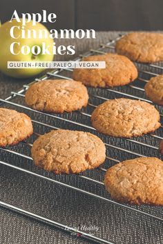 cookies cooling on a rack with an apple in the background and text overlay that reads, apple cinnamon cookies gluten - free pale pale pale vegan