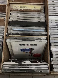 an old record rack full of various records