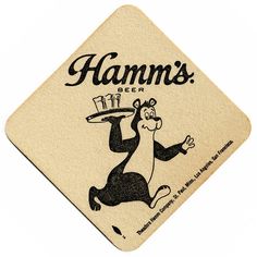 a coaster with an image of a monkey holding a beer on it's back