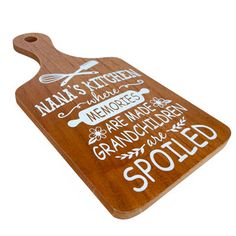 a wooden cutting board that has some writing on the front and side of it,