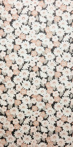 a black and white flowered background with pink flowers on the bottom half of it