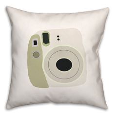 a white pillow with a camera on it