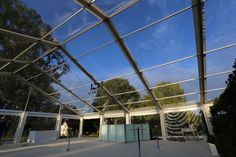 the inside of a building with glass walls