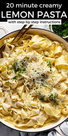 a skillet filled with pasta and topped with parmesan cheese on the side