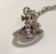 【Description】 Thank you for watching (*´∀｀) Chain about 45 cm (It is engraved on the fastener, and the back side can be extended up to 5.5cm with an orb mark and adjuster) ※It doesn't emit much purple color under fluorescent lights. Top approx. 2.5 x 2.5 cm Plating coating Accessories are only purses and jewelry cloths. Although it is an unused product, it is stored at home, so please refrain from those who are concerned about minor scratches! 【Returns】 We accept returns within 30 days of purchase. ＜Return conditions＞ -Request for return within 30 days of purchase. -Return costs are borne by the Seller. -Please inquire before application. 【International Buyers – Please Note:】 Import duties, taxes and charges are not included in the item price or shipping charges. These charges are the buye Magical Relics, Vivienne Westwood Punk, Jewelry Vivienne Westwood, Vivian Westwood, Vivienne Westwood Jewelry, Orb Necklace, Vivienne Westwood Bags, Fluorescent Lights, Vivienne Westwood Jewellery