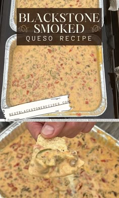 a hand holding a tortilla chip over a casserole dish