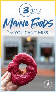 a person holding up a donut with the words maine foods you can't miss