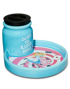 an inflatable water toy with the words down the rabbit hole on it's lid