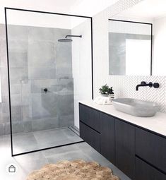 an instagram photo of a bathroom with white tile