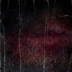 an abstract grungy background with red and black paint