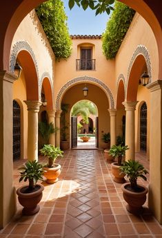 an archway with potted plants on either side