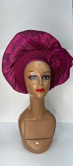 Discover the Elegance of Pre-Tied Auto Gele Step up your style game with our exquisite Pre-Tied Auto Gele, designed for the modern woman who values tradition and convenience. Our auto gele combines the beauty of traditional Nigerian headwraps with the ease of modern fashion, making it the perfect accessory for any occasion. Key Features: 📍Effortless Elegance: Enjoy the sophistication of a perfectly tied gele without the hassle. Our pre-tied design saves you time while ensuring you look flawless. 📍Premium Quality: Made from high-quality Nigerian fabrics, including Yoruba Asooke Fabric and African gele fabric, our auto gele maintains its shape and beauty wear after wear. 📍Versatile Styles: Choose from a variety of colors and patterns to match any outfit, such as red Aso-Oke gele and wine Multicolor Party Headscarf, Pink Headscarf Headband, Adjustable Bonnet For Party, Adjustable Party Bonnet, Pink Headwrap For Party, Adjustable Headband Headscarf As Gift, Adjustable Pink Bonnet As Gift, Pink Headwrap With Headband, Adjustable Pink Turban