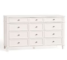 a white dresser with many drawers on it's sides and one drawer in the middle