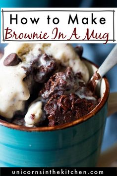 a blue mug filled with brownie in a mug and ice cream on the side