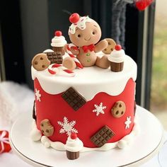 there is a cake decorated with teddy bears on the top and snowflakes on the bottom