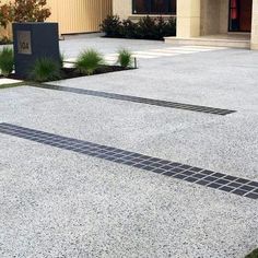 an empty parking lot in front of a building