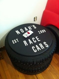 there is a black tire with the words noah's race cars on it