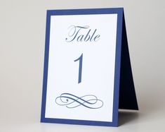 a table card with the number one on it