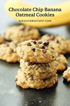 chocolate chip banana oatmeal cookies stacked on top of each other in front of a banana