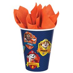 the paw patrol cups have orange napkins in them