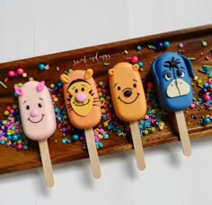 four pops with cartoon characters on them