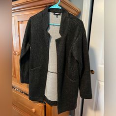 Two Pocket Jacket Cozy Wool Outerwear For Layering, Winter Wool Blazer For Layering, Winter Long Sleeve Outerwear For Layering, Cozy Black Wool Outerwear, Cozy Long Sleeve Outerwear For Layering, Cozy Long Sleeve Workwear Outerwear, Cozy Long Sleeve Outerwear For Work, Black Wool Long Sleeve Sweater Coat, Black Fall Blazer For Cold Weather