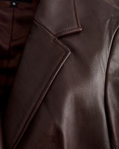 Introducing the ultimate statement piece - our sleek and stylish Leather Blazer. Crafted from the finest, 100% top grain sheep leather, this blazer is the epitome of luxury and sophistication. With its classic cut and timeless design, it's the perfect choice for any occasion, from a casual night out to a formal event. Meet the best way to elevate your style and add a touch of luxury to your wardrobe. Read more about what makes our leather special in our Leather 101 guide.  | Quince | Women's Bla Luxury Tailored Leather Jacket For Semi-formal Occasions, Luxury Blazer With Hidden Button Closure, Tailored Luxury Leather Jacket, Luxury Single Breasted Leather Jacket For Semi-formal Occasions, Luxury Single-breasted Leather Jacket For Semi-formal Occasions, Luxury Leather Jacket For Work, Sleek Brown Leather Jacket, Elegant Tailored Brown Leather Jacket, Elegant Fitted Leather Jacket With Leather Lining