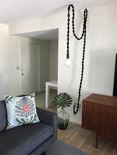 a living room filled with furniture and a flat screen tv