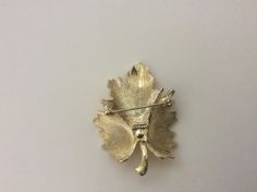 "Monet gold plated leaf brooch. Size: 2 1/8\" x 1 5/8\". Marked: copyright symbol Monet. Very good to excellent condition." Copyright Symbol, Double Chain Necklace, Leaf Brooch, 925 Ring, Double Chain, 925 Silver Rings, Black Glass, Brooch Pin, Brooches