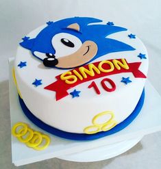 a birthday cake for someone's 10th birthday with sonic the hedgehog on top