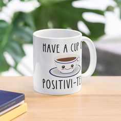 a coffee mug that says have a cup of positivity - tea on it