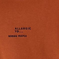 an allergic t - shirt that says,'boring people'on it