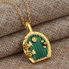 Gold Hobbit Hole, Lord Of The Rings Pendant Locket Necklace - Green Door Pendant Locket, Hobbit Hole, Green Door, Funky Jewelry, Door Color, Fantasy Jewelry, Green Necklace, Jewelry Inspo, Locket Necklace