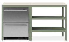 a green and white kitchen island with two drawers