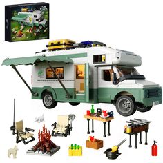 a green and white camper is shown with legos