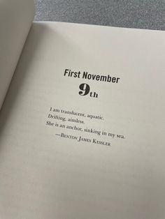 an open book with the words first november 9 th written in black and white on it