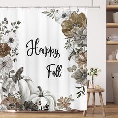 a shower curtain with flowers and pumpkins on it that says happy fall in black ink