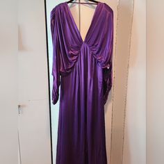 The Satin Batwing Midi Dress In Purple By Asos Edition. Tag Says Us 10. Fits Size 14. Waist Is 16.5 In. No Ptp Due To Bathing Design. Cuffs Zipper. Has Shoulder Pads And Is Lined. Very Dramatic Dress. Please Go To Asos To See. Never Worn. Is Presently $70 On Asos Site. Purple V-neck Lined Dress, Purple V-neck Maxi Dress For Cocktail, Lined Purple Evening Dress, Purple Lined Evening Dress, Purple Lined Dress For Evening, Lined Purple Dress For Evening, Purple V-neck Dinner Dress, V-neck Cocktail Maxi Dress, Ancient Roman Clothing