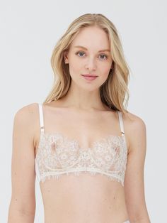 Fit Tip: Non-stretch lace. For fuller breasts, consider going up a cup in size. The Entice bra is delicate and light enough to make it the perfect sexy sheer bra. With just a hint of show through and an unlined balconette shape, this bra is sure to be a Skarlett Blue favorite in your lingerie wardrobe. The sexiest bra you'll find online. Unlined, underwire with balconette lace cups. Eyelash scalloped edge trims neckline. Brushed elastic at underarm for containment. Soft fabric backs for smooth l Sheer Bras, Hipster Skirt, Lace Balconette, Strapless Backless Bra, Backless Bra, Convertible Bra, Sheer Bra, Balconette Bra, Lace Thong